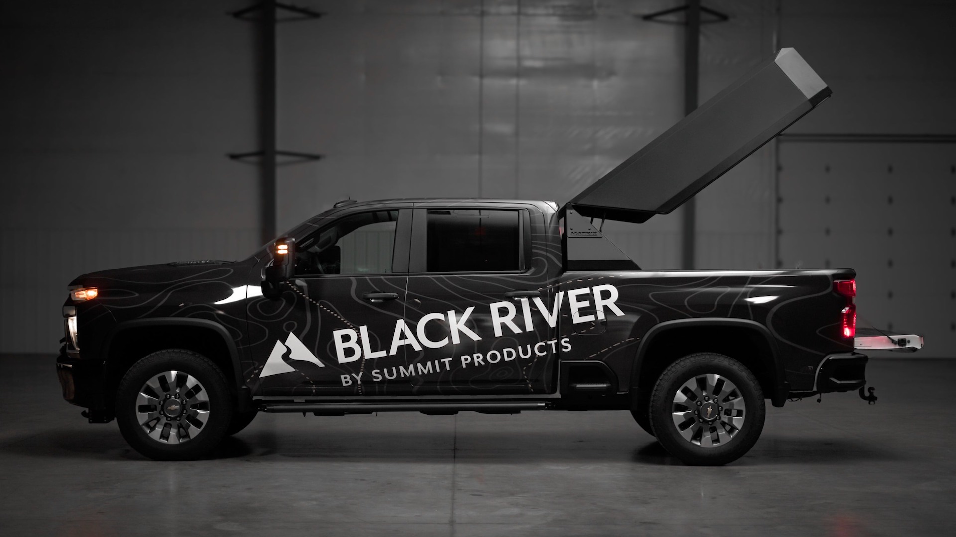 Why Didn’t I Think of the Flip-Up Truck Bed Cap?