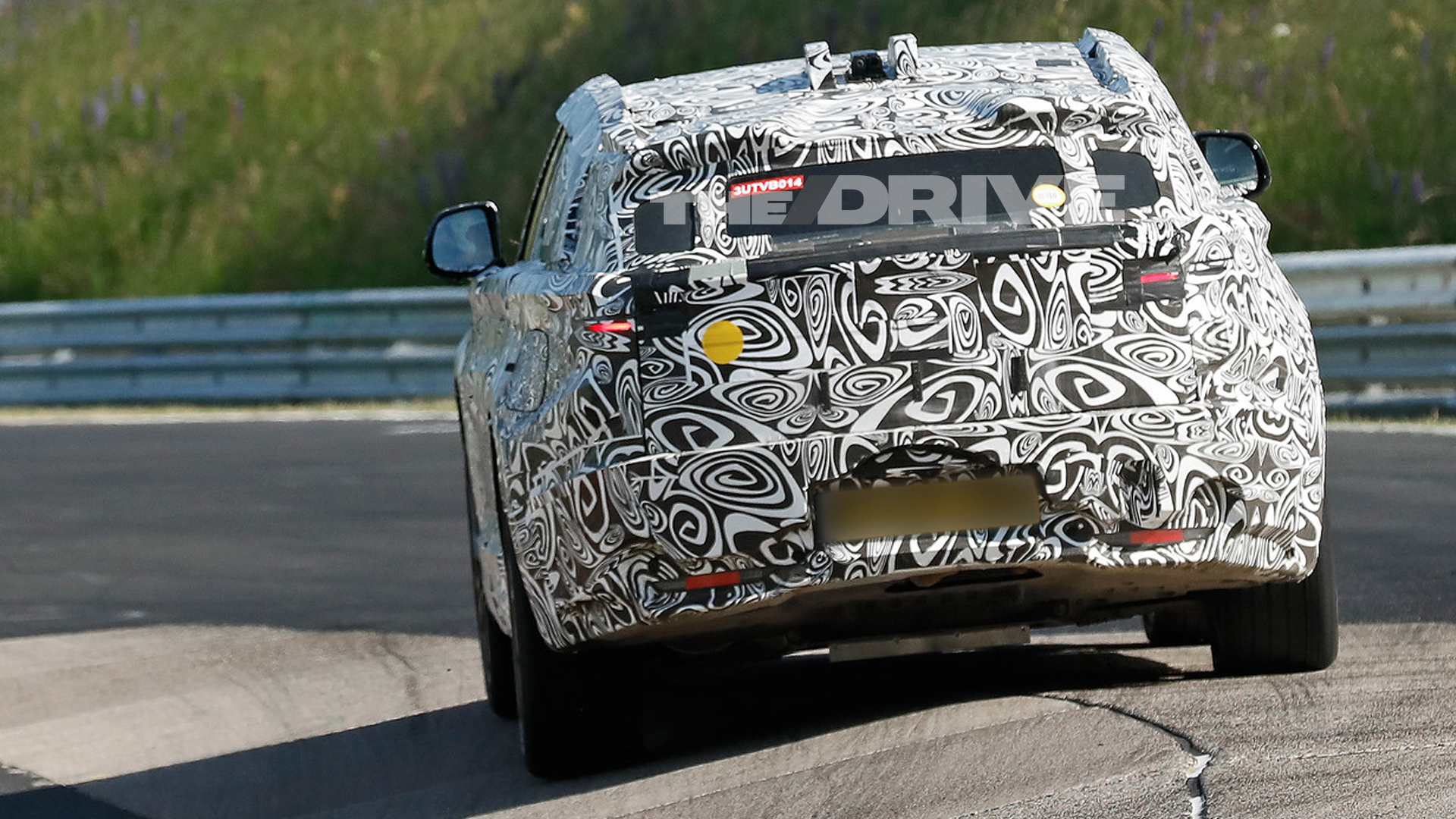 Range Rover Velar EV Spied With Weird Aero and Cladding