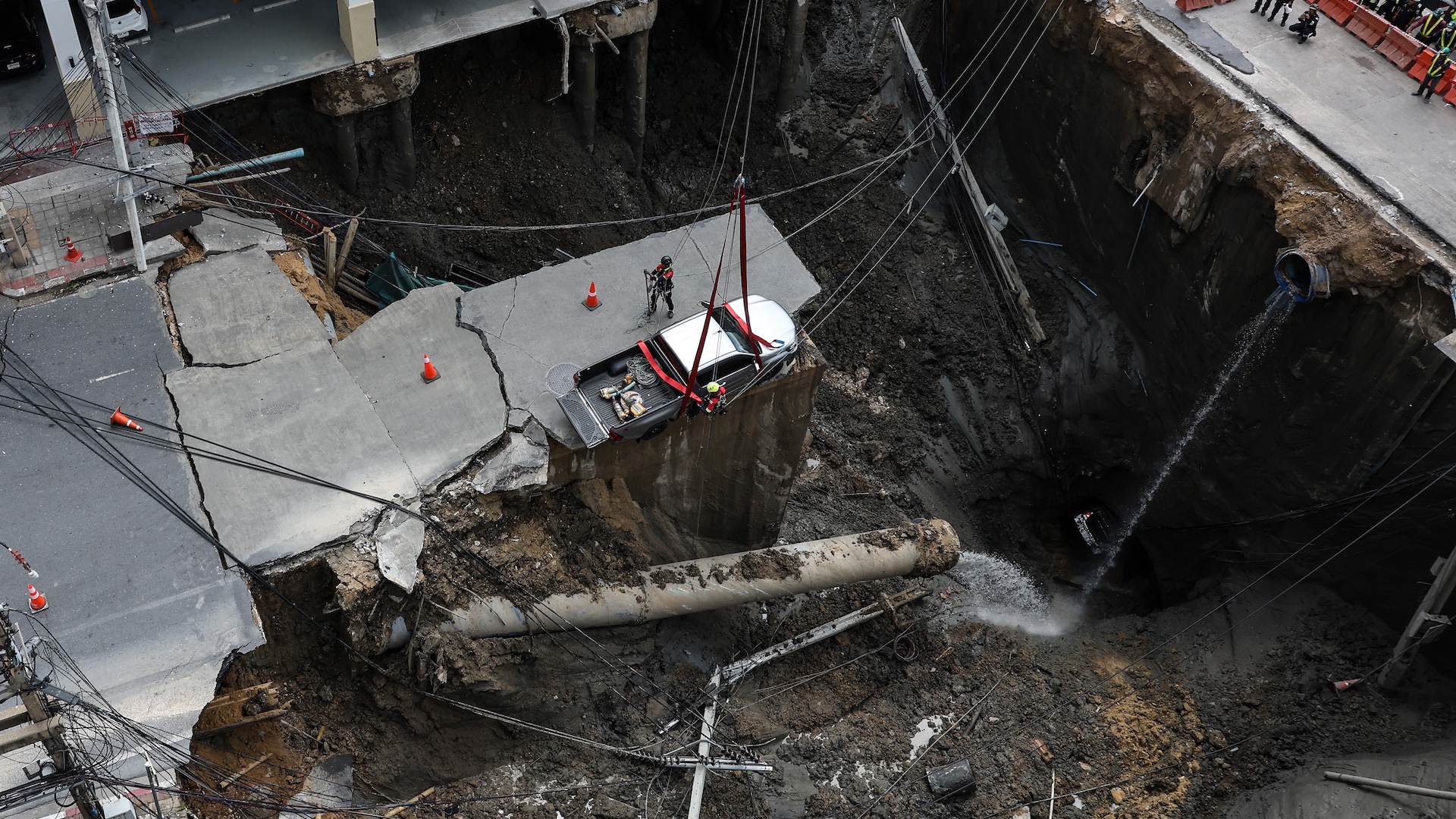 Watch an Entire Street Just Vanish Into a Giant Sinkhole