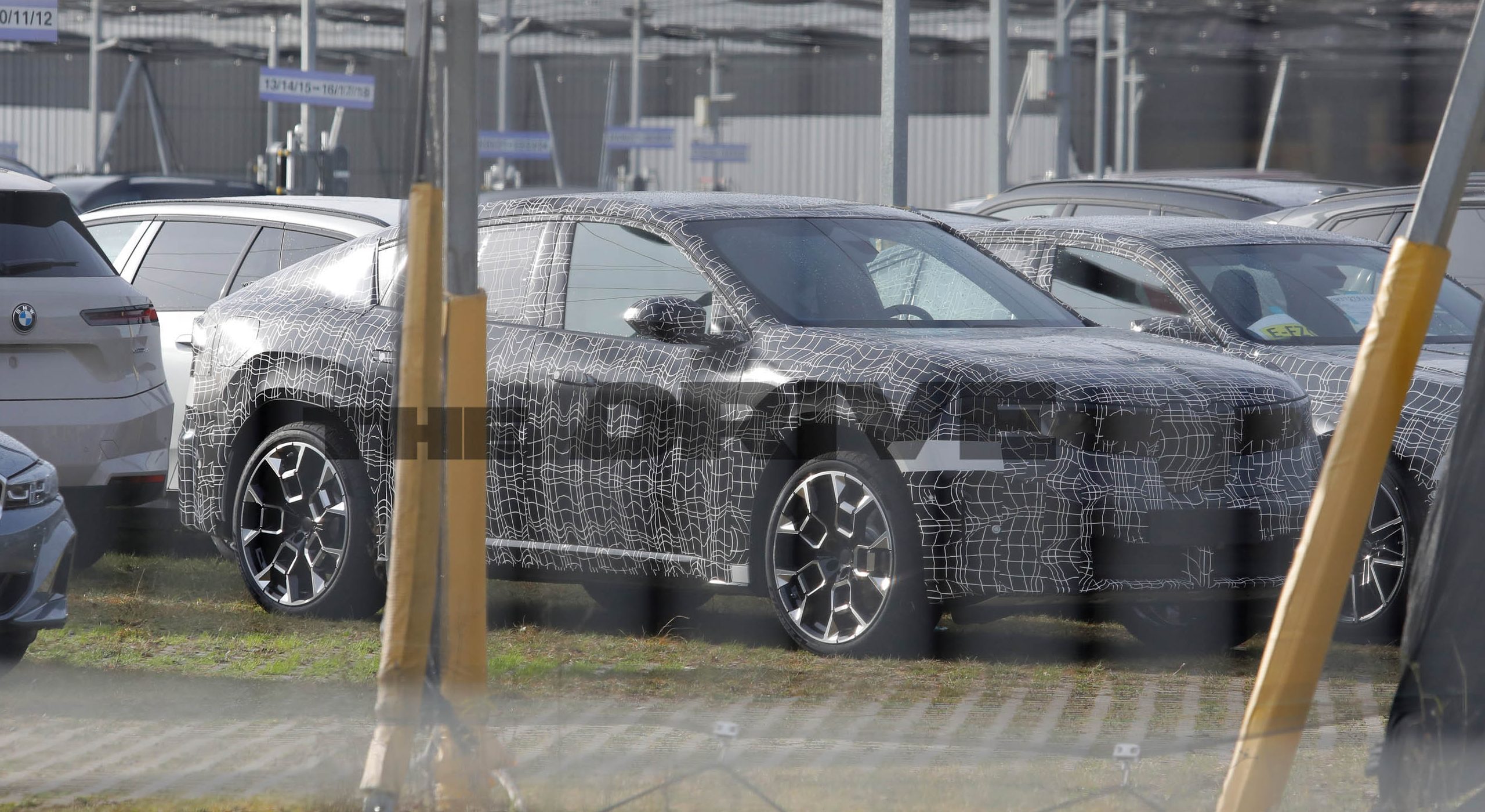 Spied: 2027 BMW iX4 Proves Four-Door Coupe SUV EVs Are Coming