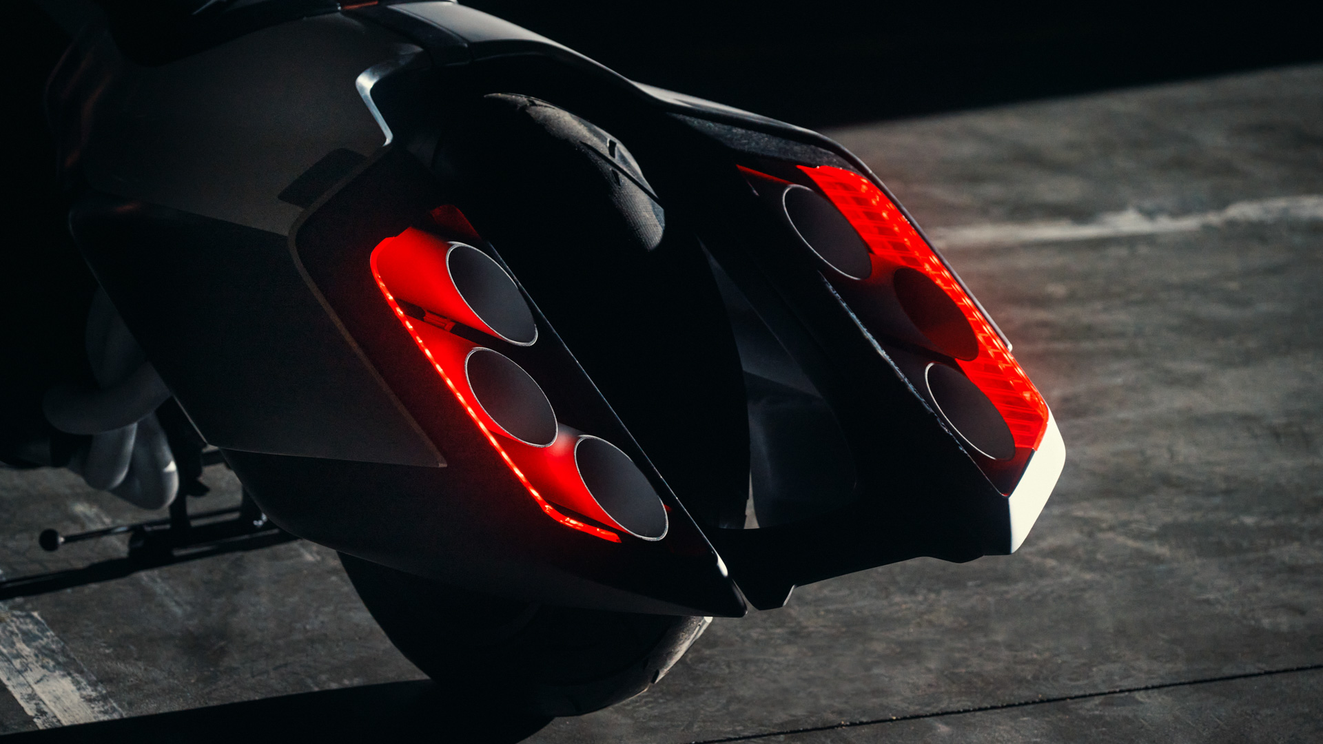 Radical Exhaust Pipes on BMW’s Vision K18 Concept Look Like Starship Thrusters
